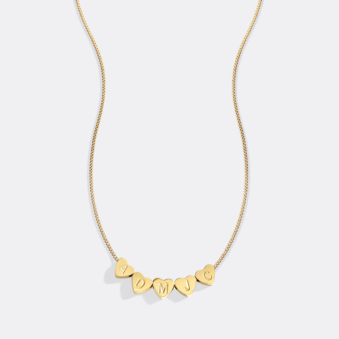 Collana iniziale a cuore impilabile delicata