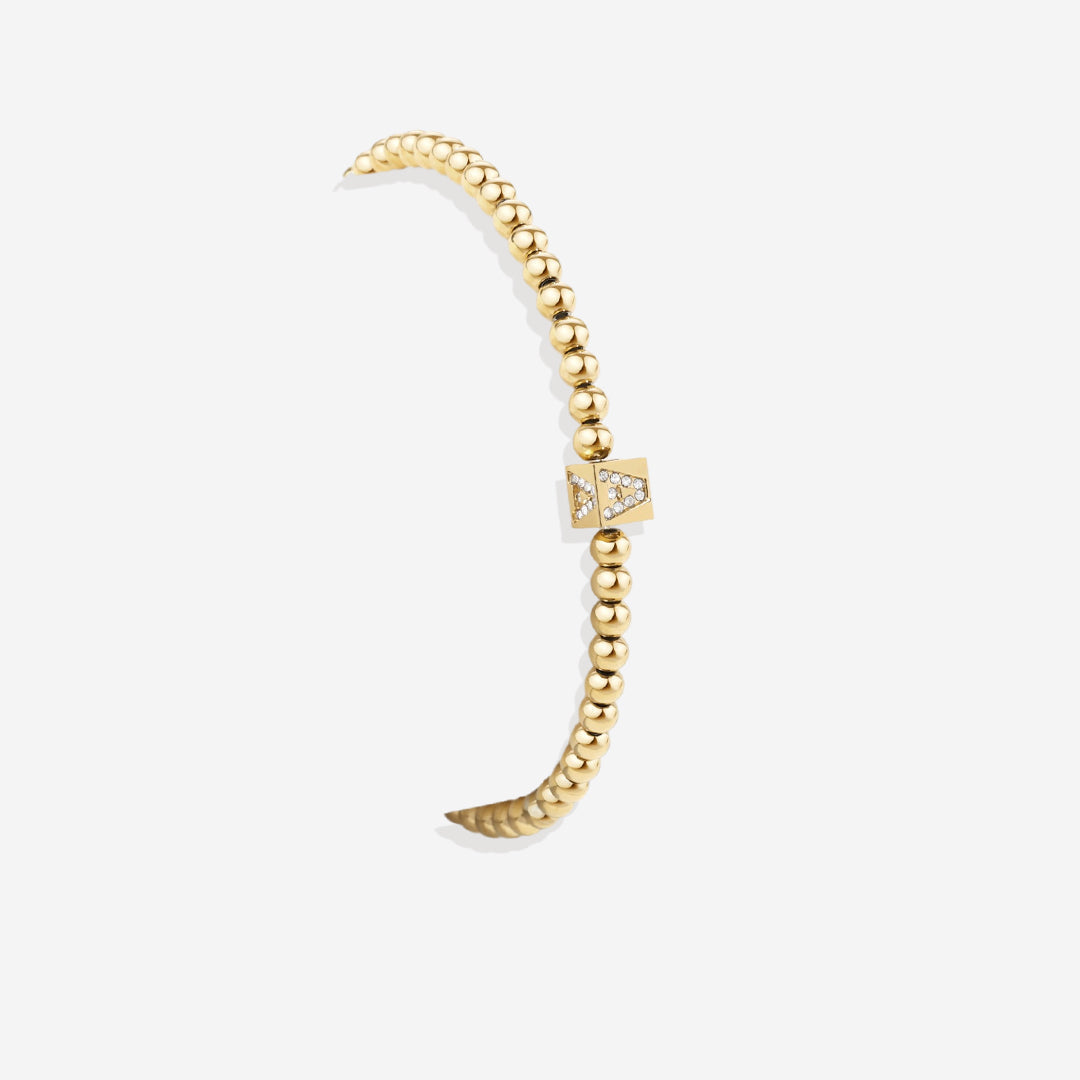 Bracciale con iniziale a blocchi e perline dorate