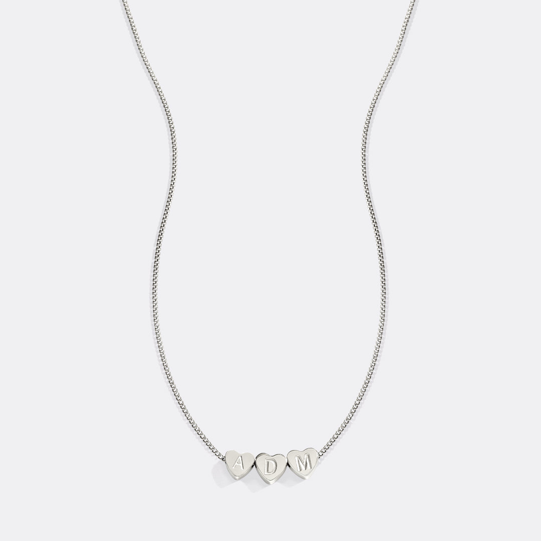 Collana iniziale a cuore impilabile delicata