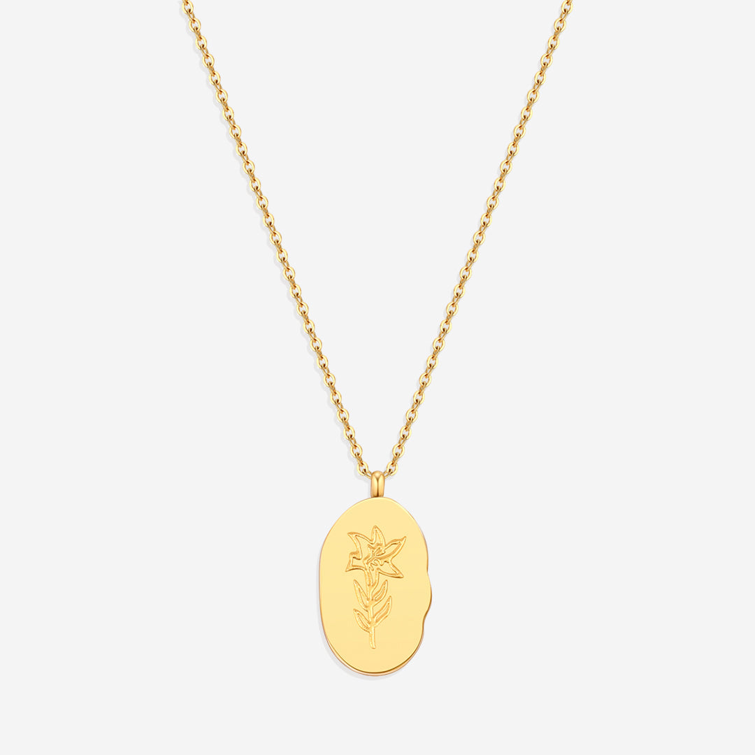 Gold Birth Flower Pendant Necklace in gold tone with December birthstone