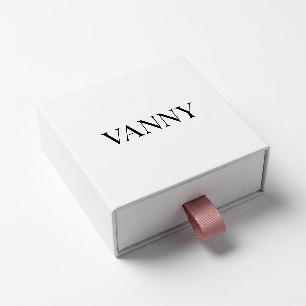 Vanny Jewels white gift box closed with pink ribbon pull