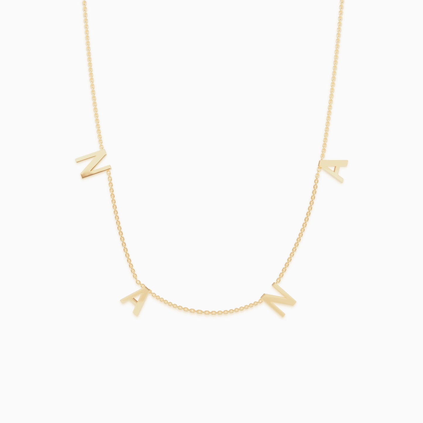 The NANA Letter Necklace in gold tone