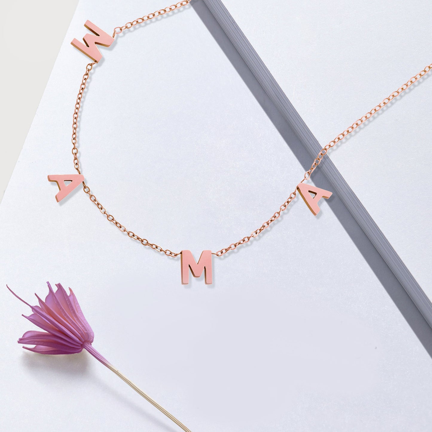 The MAMA Letter Necklace in rose gold tone